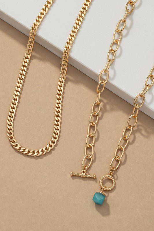 Cuban chain and a green natural stone pendant
